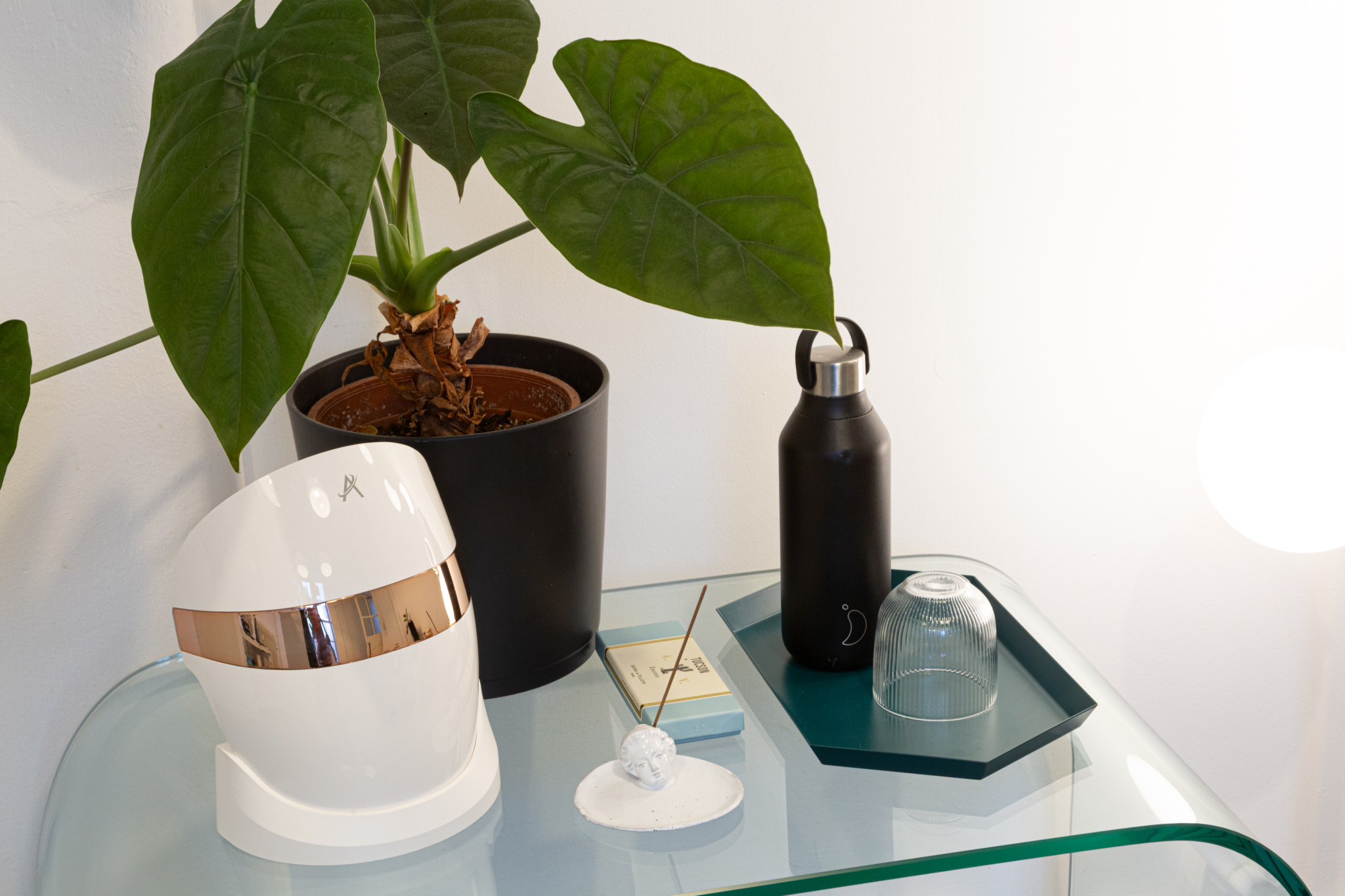 Marco's complimentary client pleasantries table including water and incense in his London studio